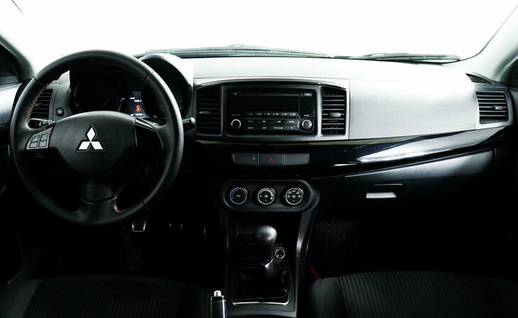 Mitsubishi Lancer - Фото 8