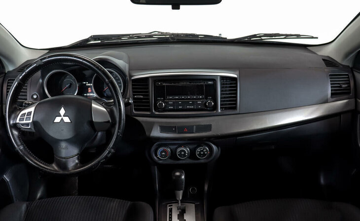Mitsubishi Lancer - Фото 5