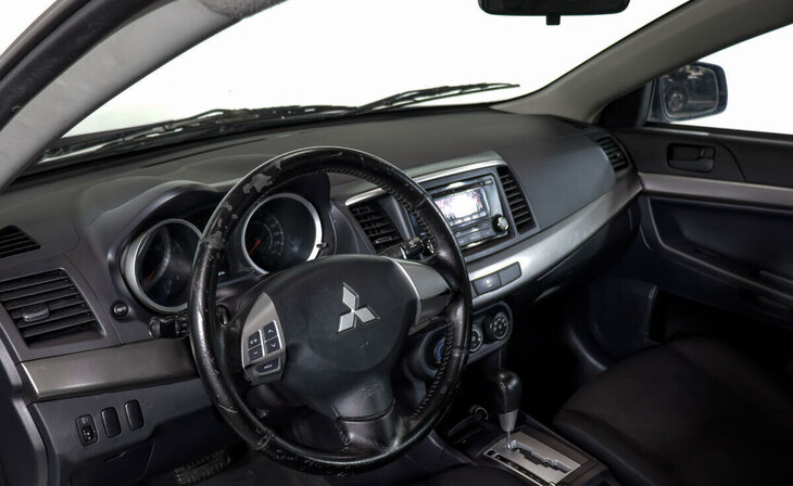 Mitsubishi Lancer - Фото 6