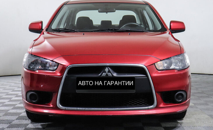Mitsubishi Lancer - Фото 1