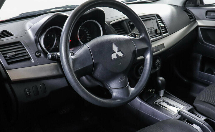 Mitsubishi Lancer - Фото 6