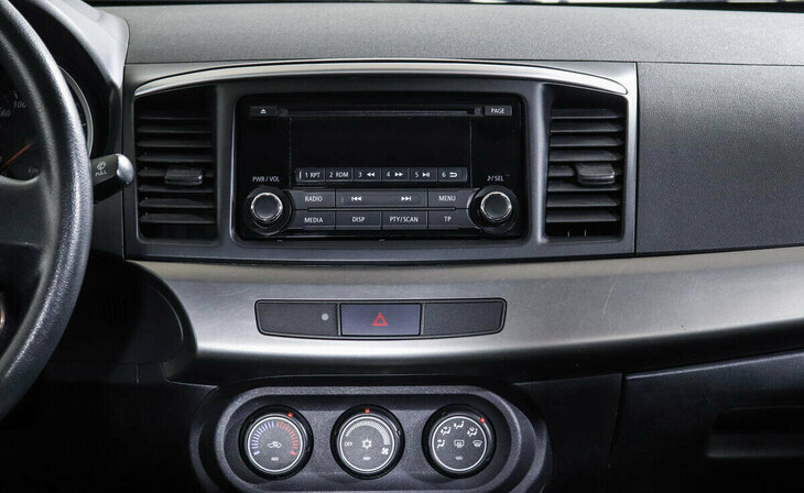 Mitsubishi Lancer - Фото 7