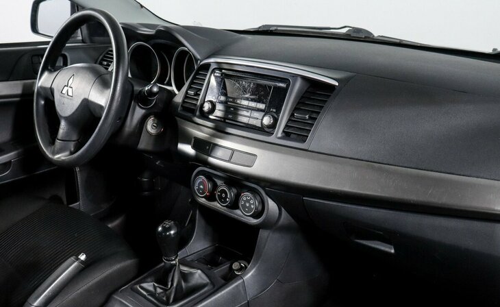 Mitsubishi Lancer - Фото 5