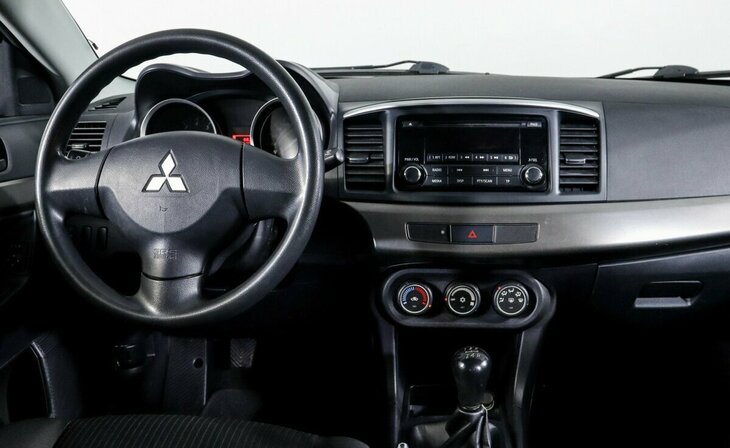 Mitsubishi Lancer - Фото 6