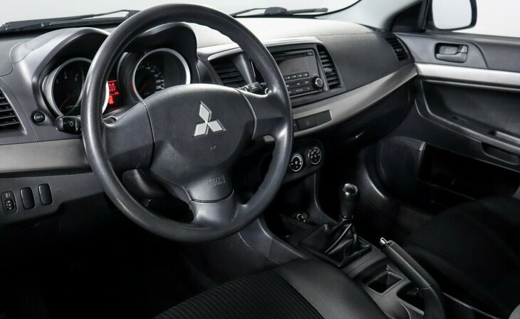 Mitsubishi Lancer - Фото 7