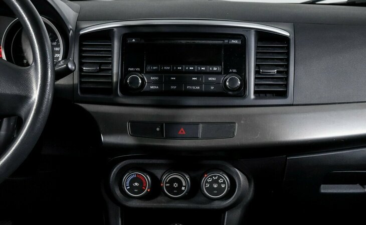 Mitsubishi Lancer - Фото 8