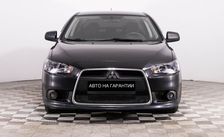 Mitsubishi Lancer - Фото 1
