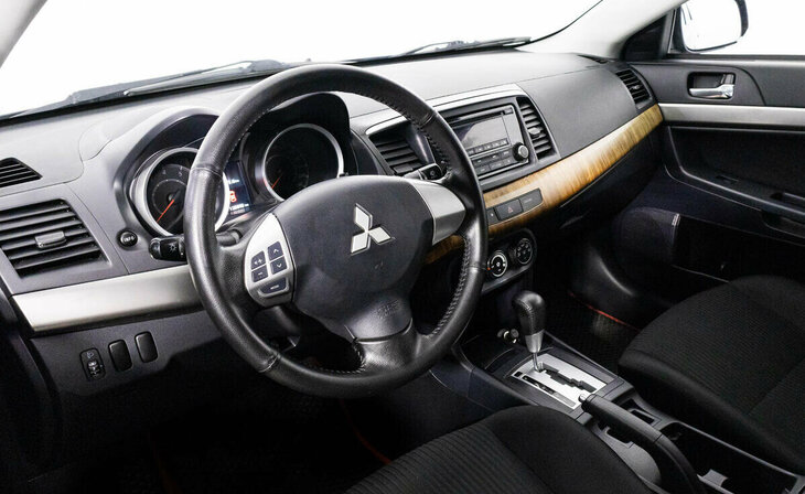 Mitsubishi Lancer - Фото 6