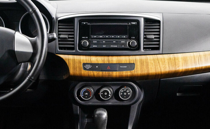 Mitsubishi Lancer - Фото 7