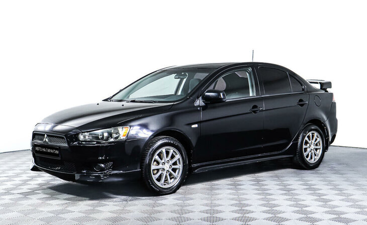 Mitsubishi Lancer - Фото 0