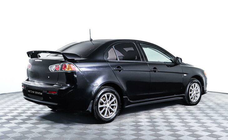 Mitsubishi Lancer - Фото 4