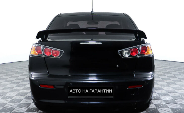 Mitsubishi Lancer - Фото 5