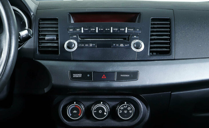 Mitsubishi Lancer - Фото 8